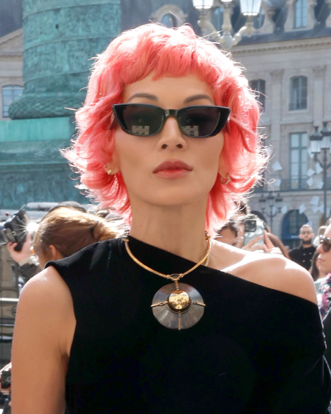 Closeup shot of an '80s shaggy bob in pink